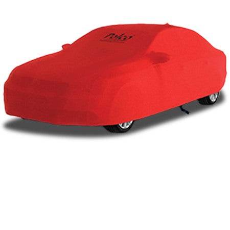 Red car cover protecting a vehicle, emphasizing how to maintain your covers for maximum durability.